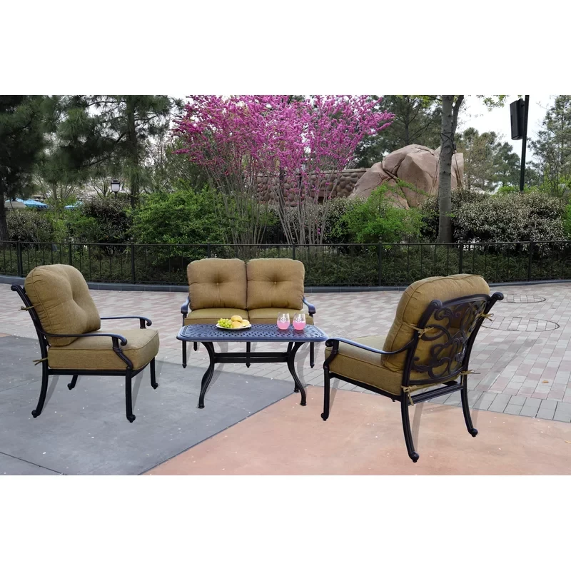 Nanafalia 4-Piece Patio Loveseat Conversation Set with Cushions and 21 x 42'' Rectangular Coffee Table