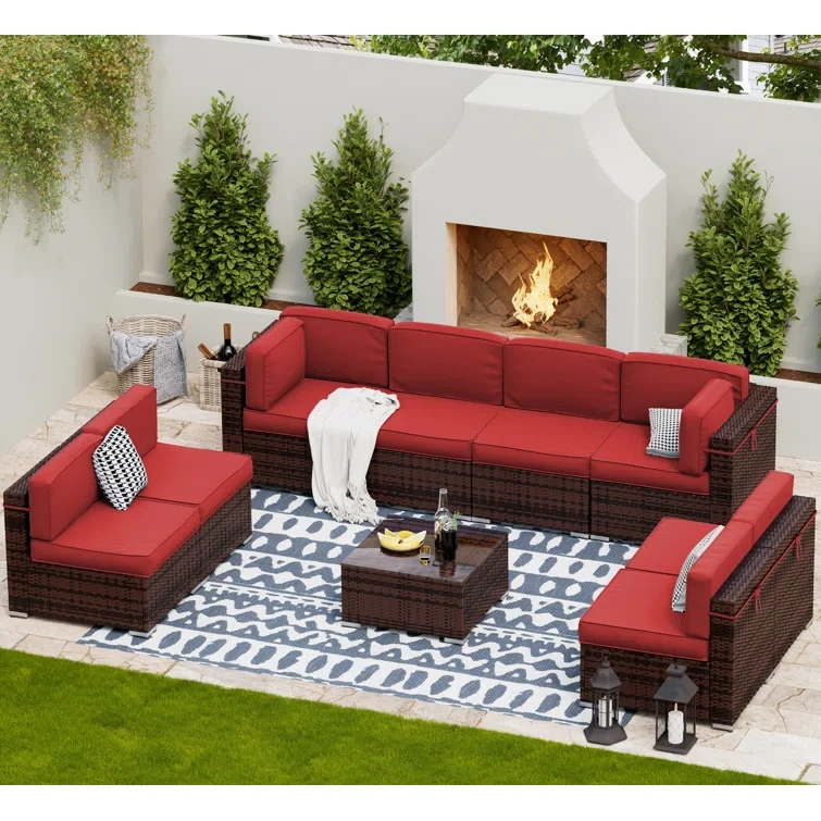 Keolani 9 Piece Rattan Sectional Seating Group with Cushions