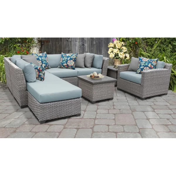 Amjad 8 Piece Rattan Seating Group with Sunbrella Cushions