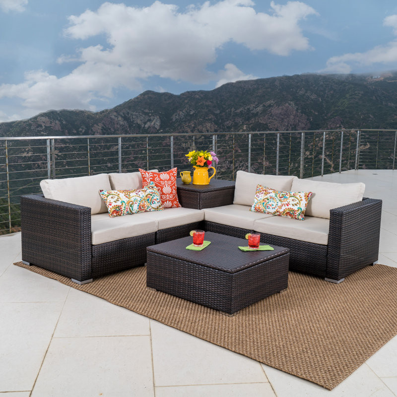 Tyle 4 Piece Rattan Sectional Seating Group with Cushions