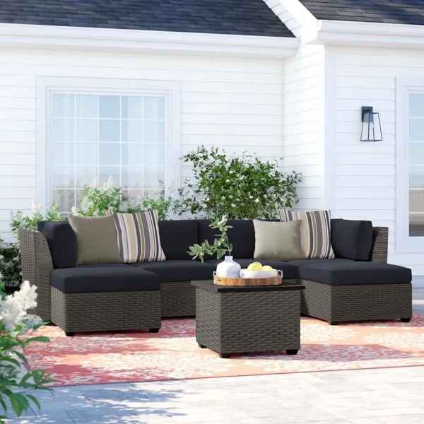 Amjad 7 Piece Outdoor Sectional Seating Group with Cushions