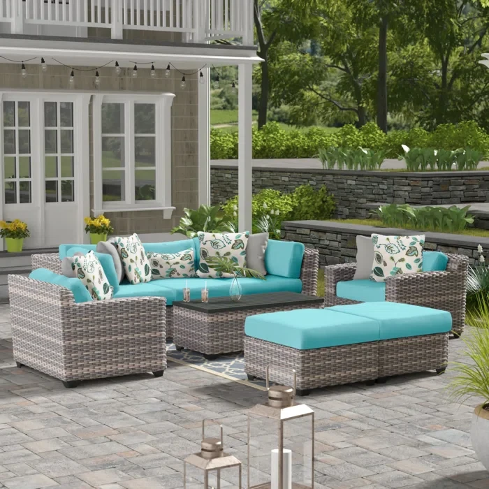 Amjad 8 Piece Outdoor Sectional Seating Group with Cushions