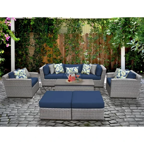 Amjad 8 Piece Outdoor Sectional Seating Group with Cushions