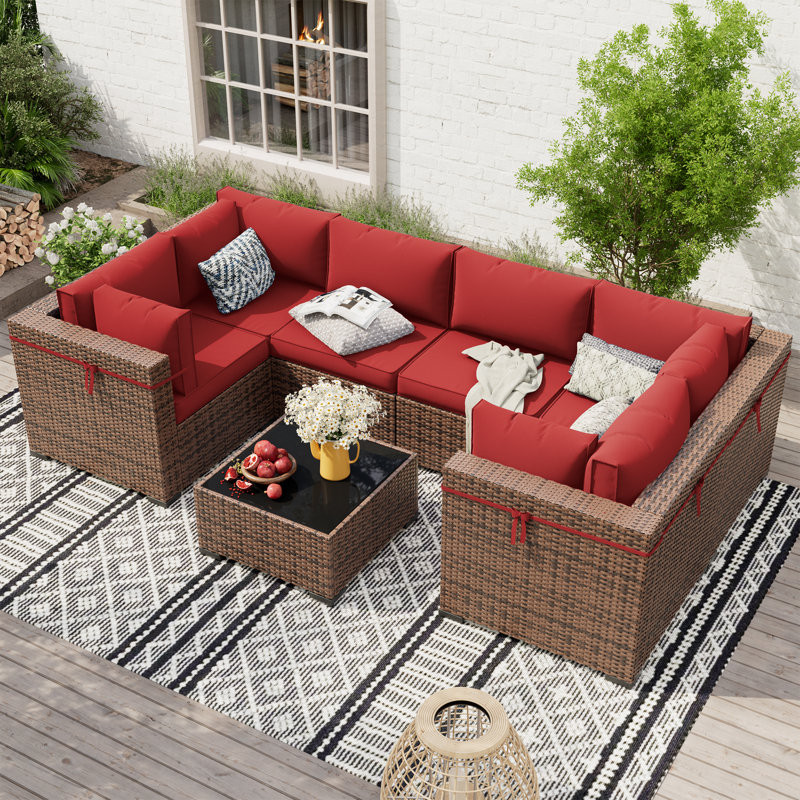 Mecayla 7 Piece Rattan Sectional Seating Group with Cushions