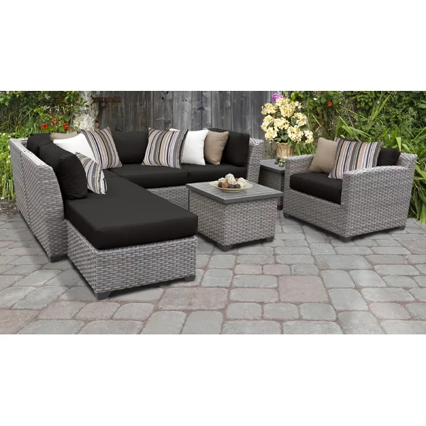 Amjad 8 Piece Rattan Seating Group with Sunbrella Cushions