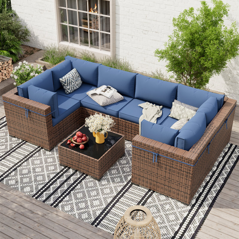 Mecayla 7 Piece Rattan Sectional Seating Group with Cushions