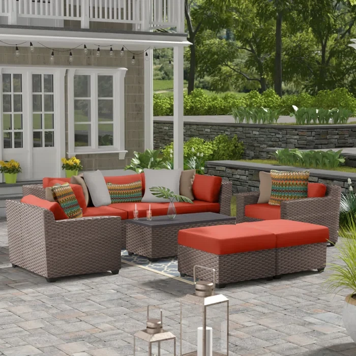 Amjad 8 Piece Outdoor Sectional Seating Group with Cushions