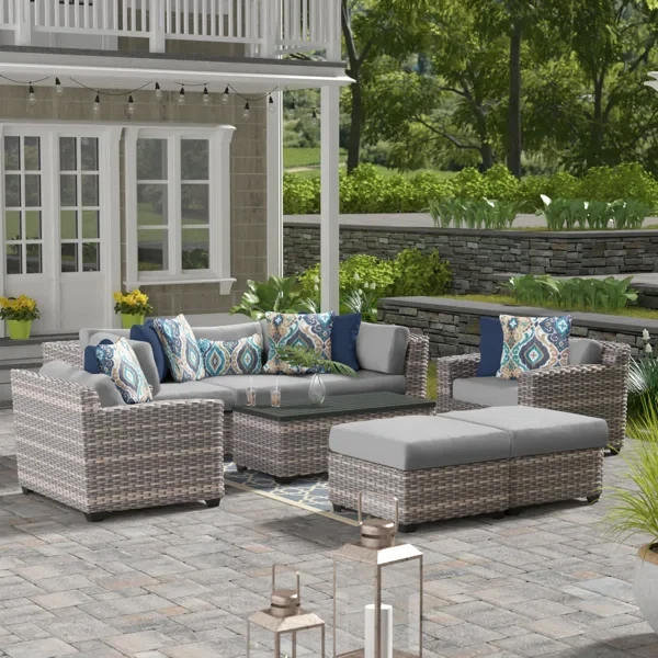 Amjad 8 Piece Outdoor Sectional Seating Group with Cushions