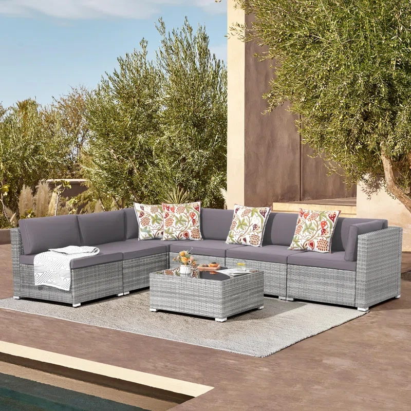 Sanjaya Rattan Sectional Seating Group with Cushions