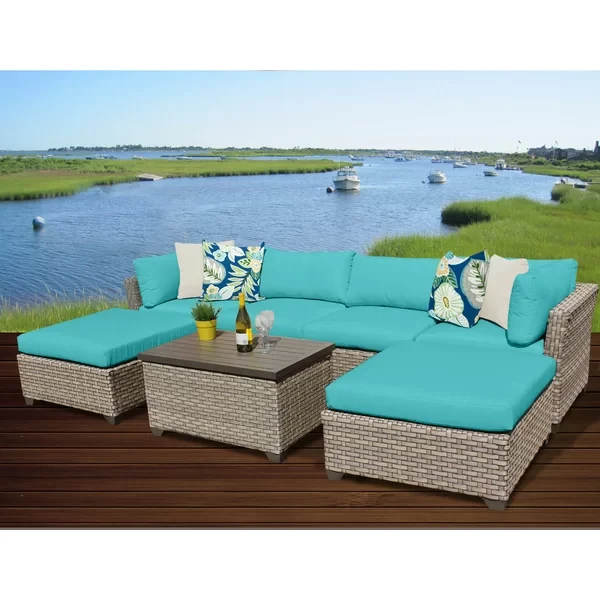 Anupras 7 Piece Rattan Sectional Seating Group with Cushions