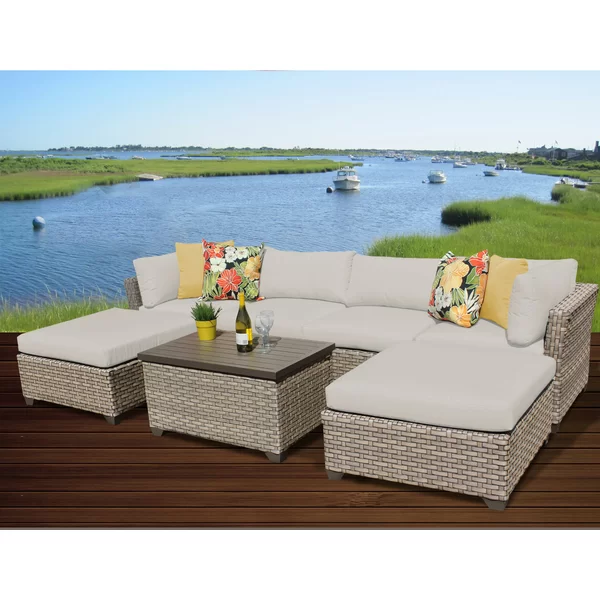 Anupras 7 Piece Rattan Sectional Seating Group with Cushions