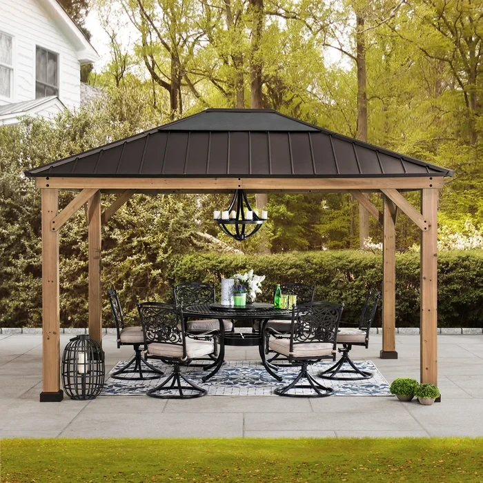 Grayden 11 ft. D x 13 ft. W Patio Cedar Framed Gazebo with Brown Steel and Polycarbonate Hip Roof