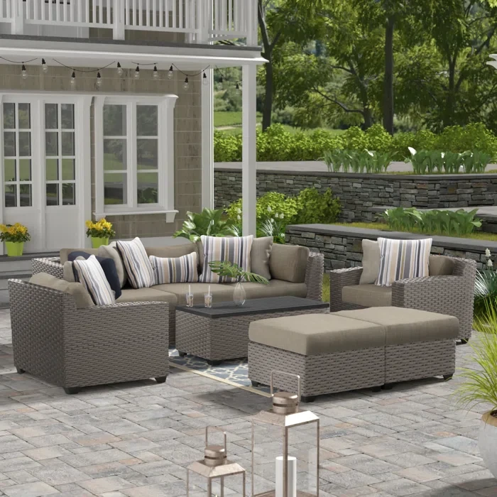 Amjad 8 Piece Outdoor Sectional Seating Group with Cushions