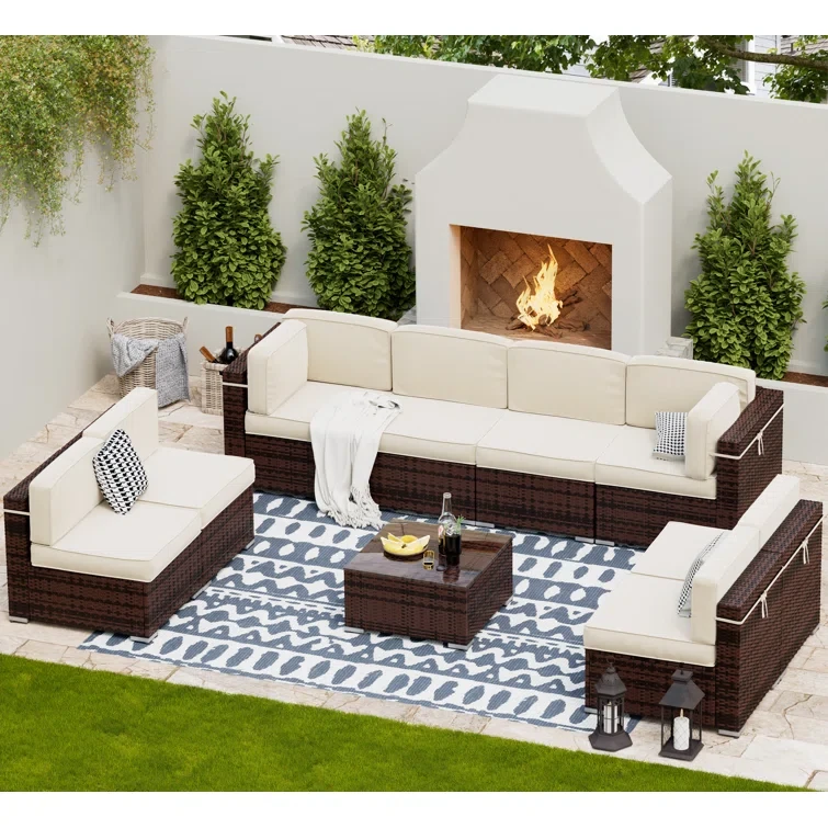 Keolani 9 Piece Rattan Sectional Seating Group with Cushions