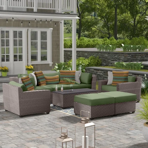 Amjad 8 Piece Outdoor Sectional Seating Group with Cushions