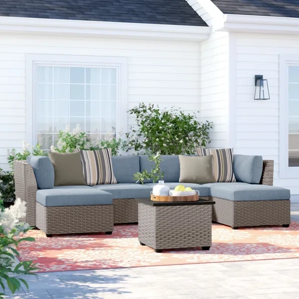 Amjad 7 Piece Outdoor Sectional Seating Group with Cushions