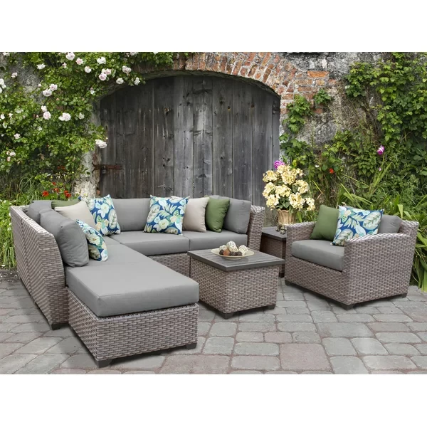 Amjad 8 Piece Rattan Seating Group with Sunbrella Cushions