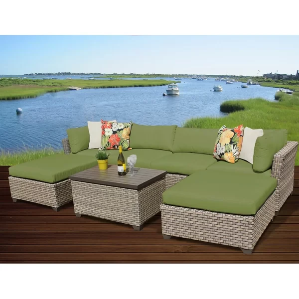 Anupras 7 Piece Rattan Sectional Seating Group with Cushions