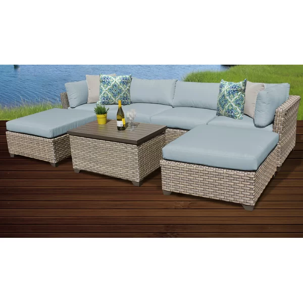 Anupras 7 Piece Rattan Sectional Seating Group with Cushions