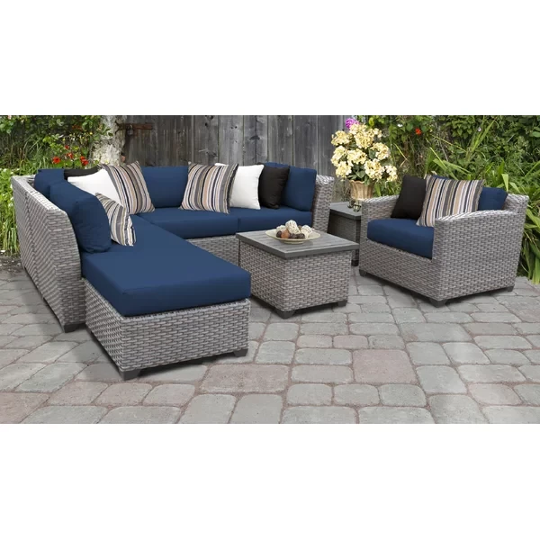 Amjad 8 Piece Rattan Seating Group with Sunbrella Cushions