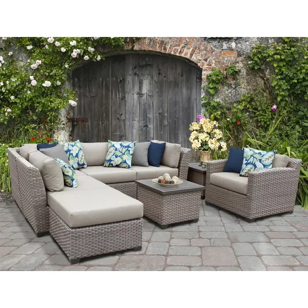 Amjad 8 Piece Rattan Seating Group with Sunbrella Cushions