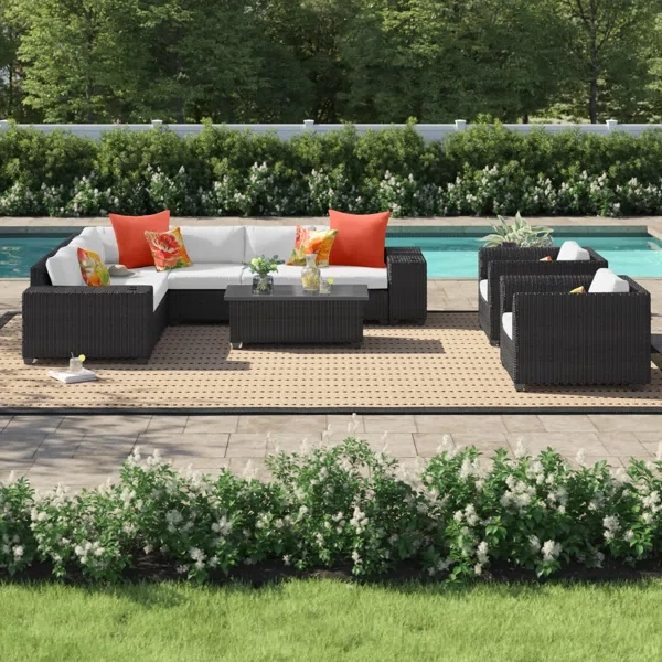 Larrissa 11 Piece Rattan Sectional Seating Group with Cushions