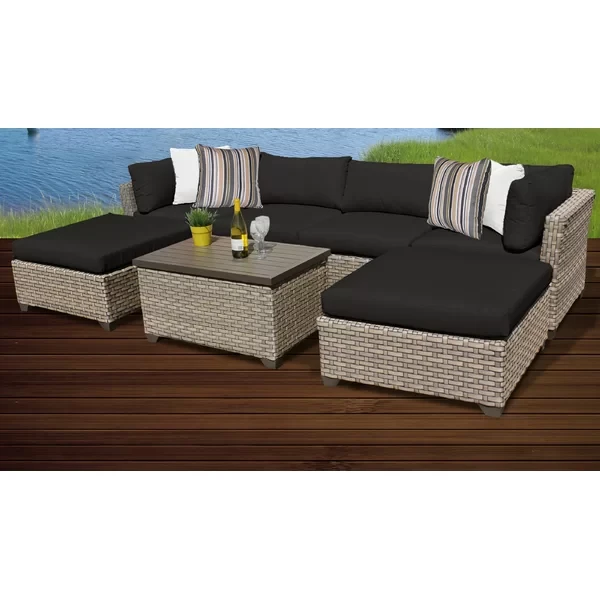 Anupras 7 Piece Rattan Sectional Seating Group with Cushions