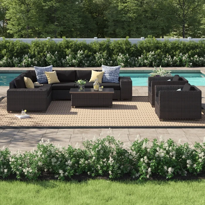 Larrissa 11 Piece Rattan Sectional Seating Group with Cushions