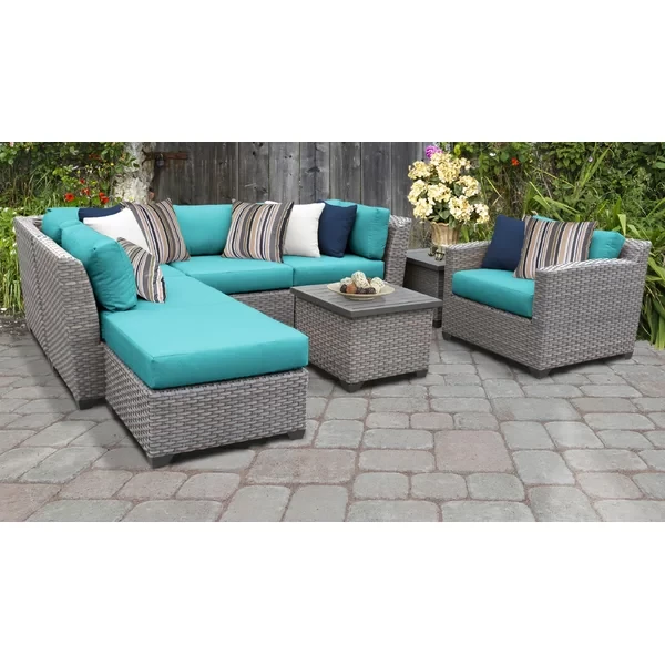 Amjad 8 Piece Rattan Seating Group with Sunbrella Cushions