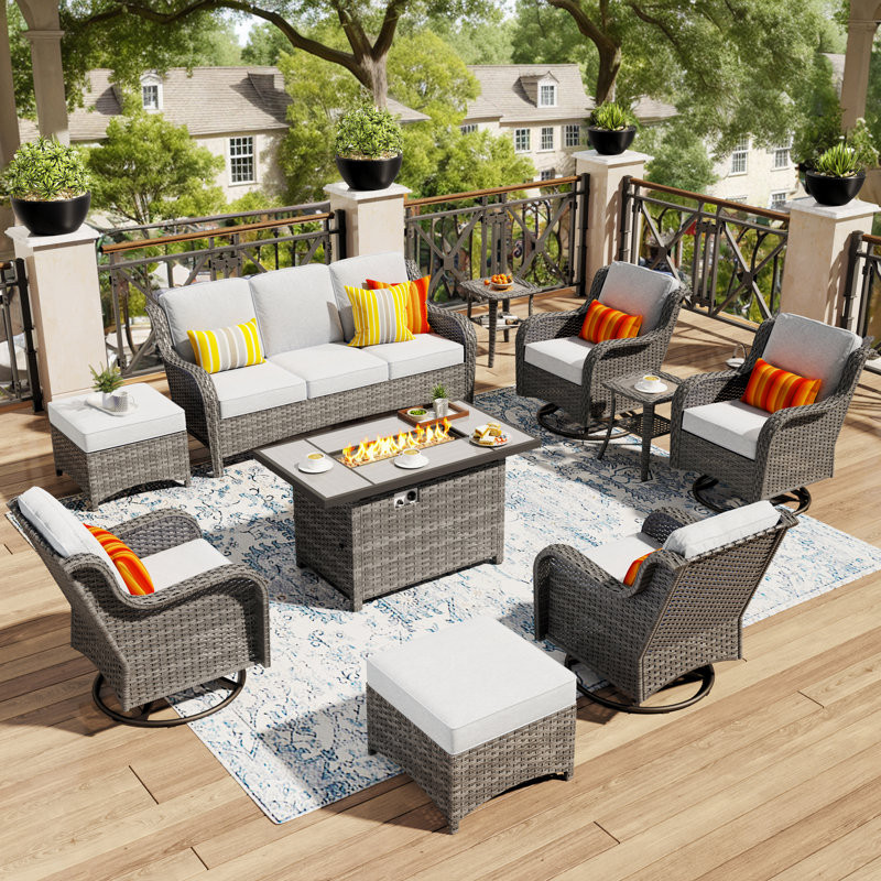 Outdoor Wicker 7 Person Seating Group With Cushions With A Fire Pit