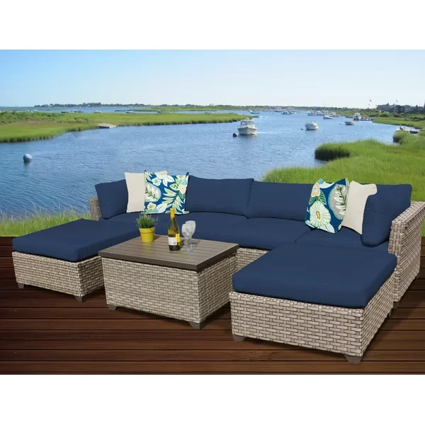 Anupras 7 Piece Rattan Sectional Seating Group with Cushions