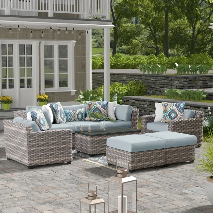 Amjad 8 Piece Outdoor Sectional Seating Group with Cushions