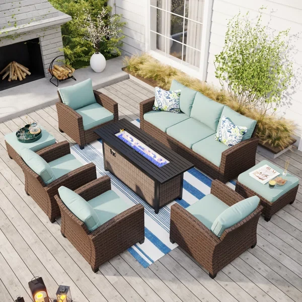 Argyri 9 - Person Outdoor Wicker Patio Conversation Furniture Set with Fire Pit Table