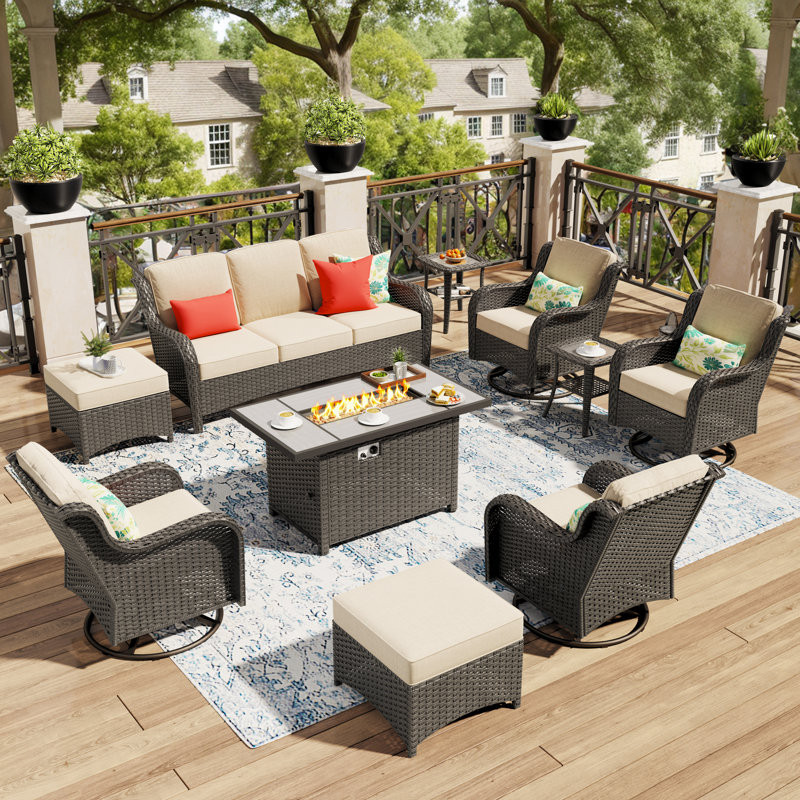 Outdoor Wicker 7 Person Seating Group With Cushions With A Fire Pit