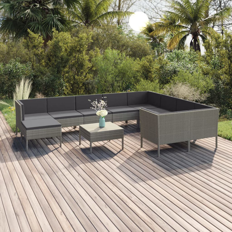 Bayshawne 11 Piece Rattan Sectional Seating Group with Cushions