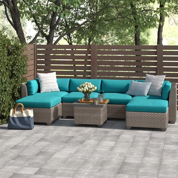 Amjad 7 Piece Outdoor Sectional Seating Group with Cushions