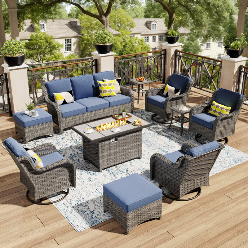 Outdoor Wicker 7 Person Seating Group With Cushions With A Fire Pit