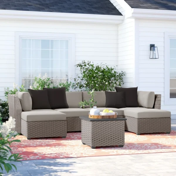 Amjad 7 Piece Outdoor Sectional Seating Group with Cushions