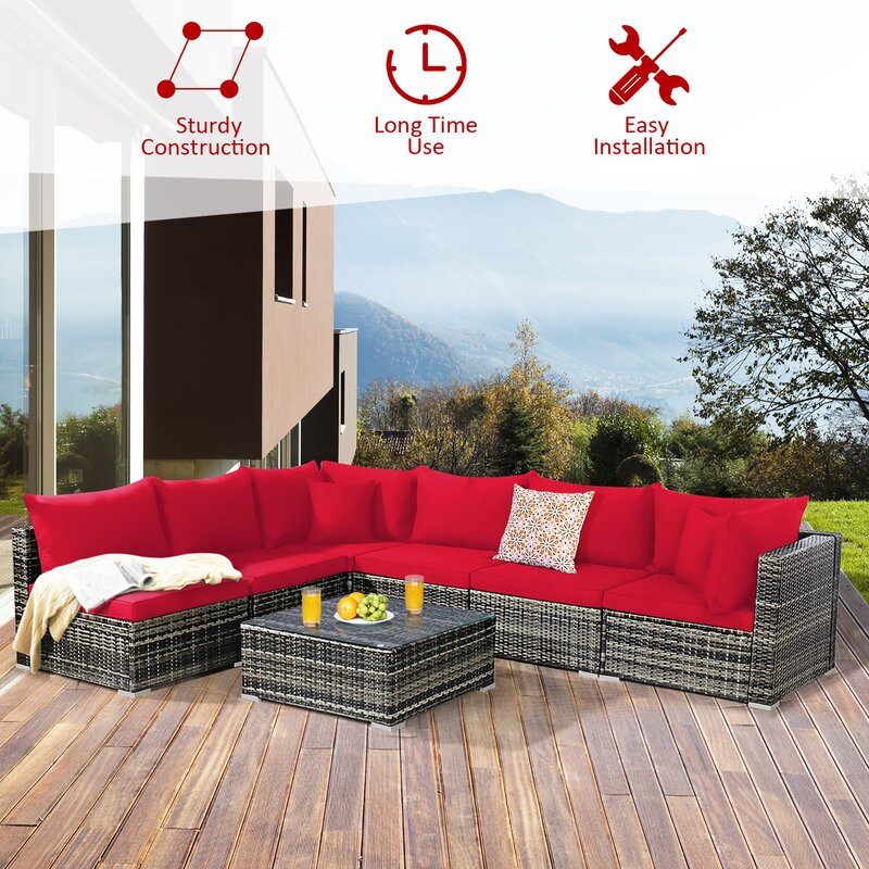 Amarjeet 7 Piece Rattan Sectional Seating Group with Cushions