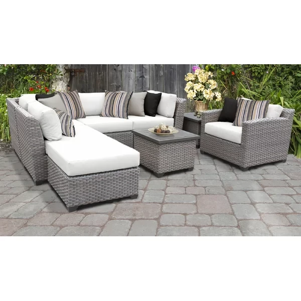 Amjad 8 Piece Rattan Seating Group with Sunbrella Cushions