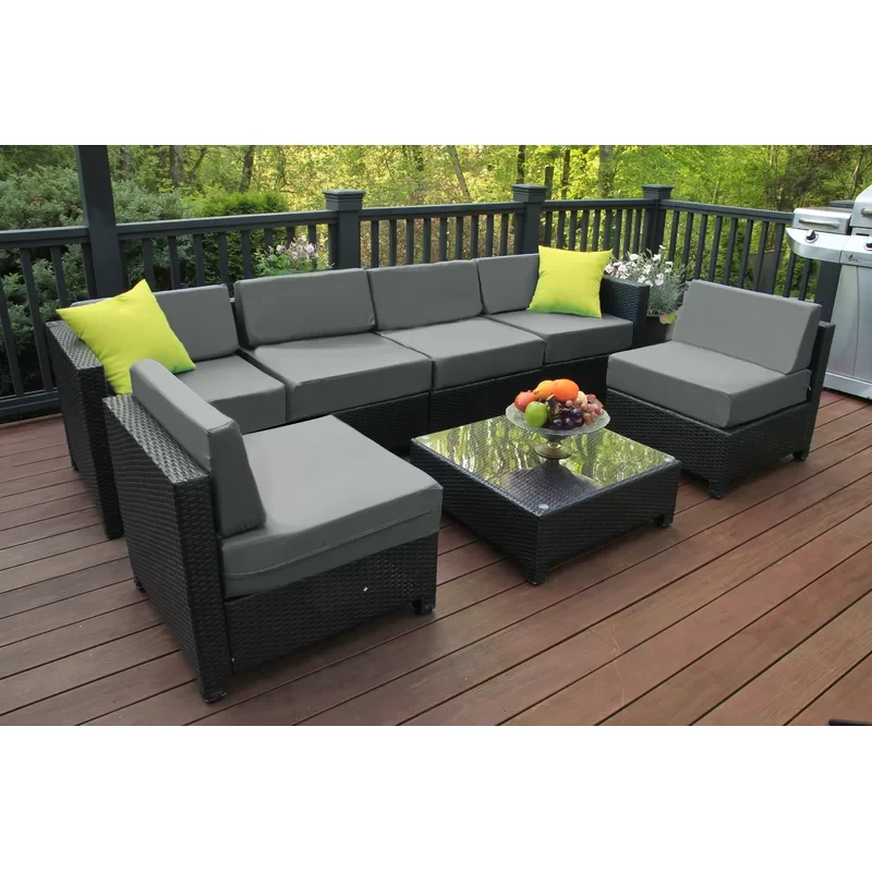 Lelusa 7 Piece Patio Wicker Outdoor Sectional Seating Group with Cushions Glass Coffee Table