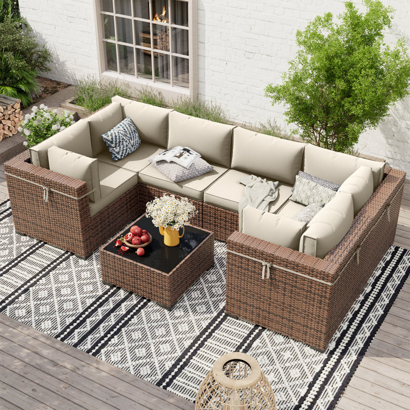 Mecayla 7 Piece Rattan Sectional Seating Group with Cushions