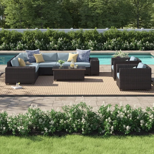 Larrissa 11 Piece Rattan Sectional Seating Group with Cushions