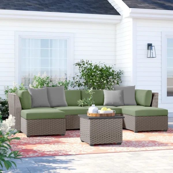 Amjad 7 Piece Outdoor Sectional Seating Group with Cushions