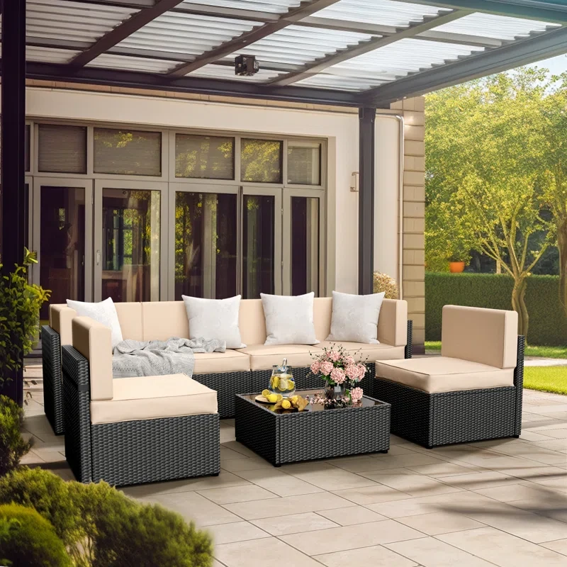 Arwynn 7 Piece Rattan Sectional Seating Group with Cushions