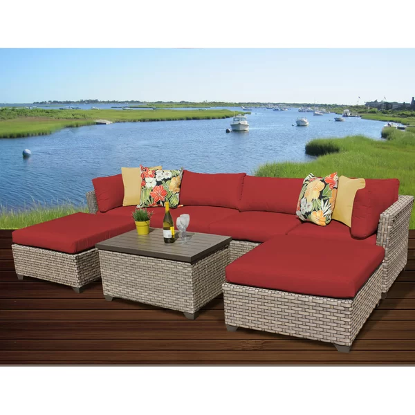 Anupras 7 Piece Rattan Sectional Seating Group with Cushions