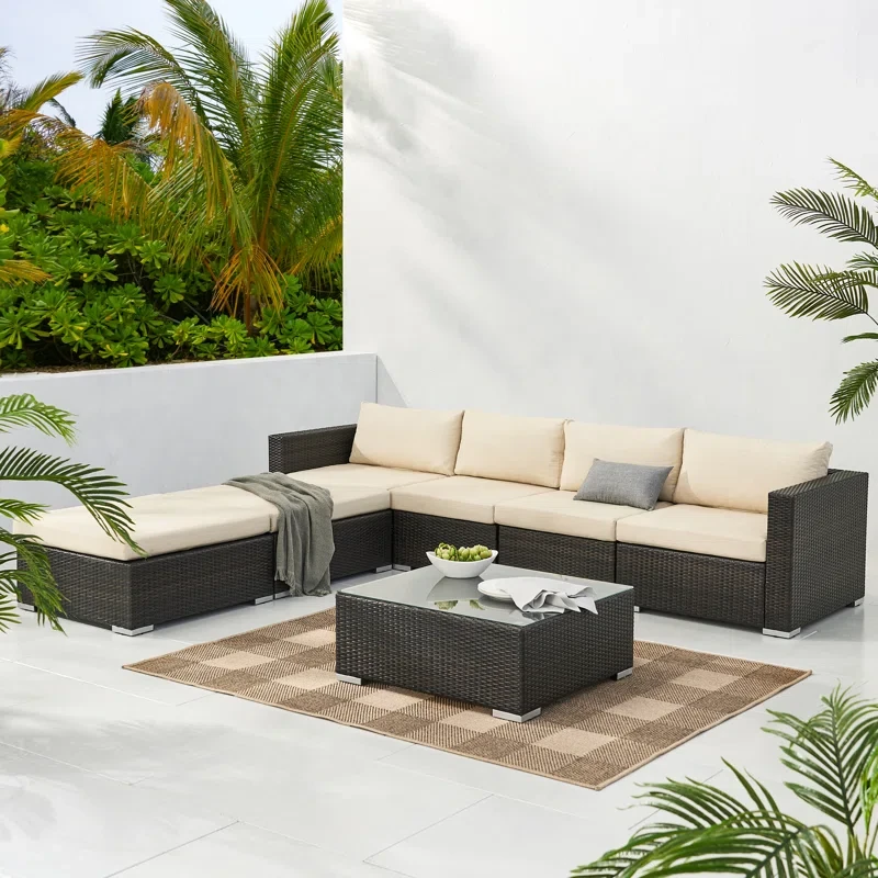 7 Piece Rattan Sectional Seating Group with Cushions