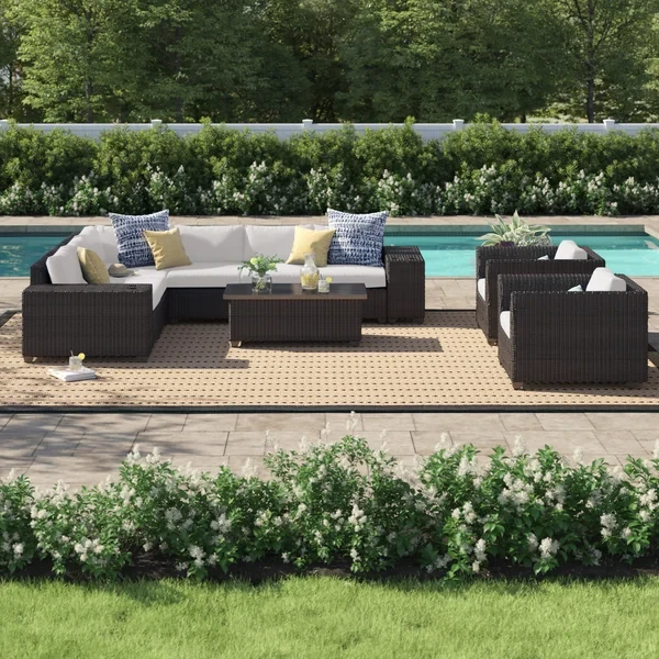 Larrissa 11 Piece Rattan Sectional Seating Group with Cushions