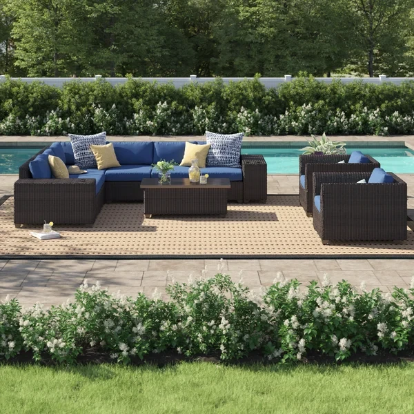 Larrissa 11 Piece Rattan Sectional Seating Group with Cushions