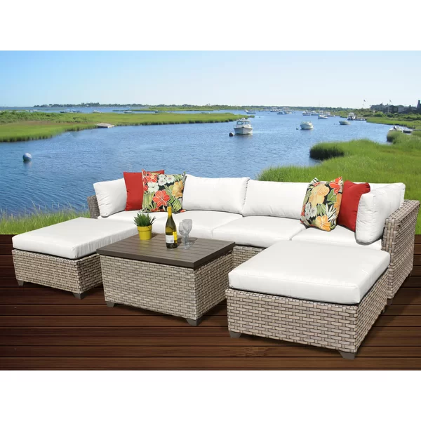 Anupras 7 Piece Rattan Sectional Seating Group with Cushions